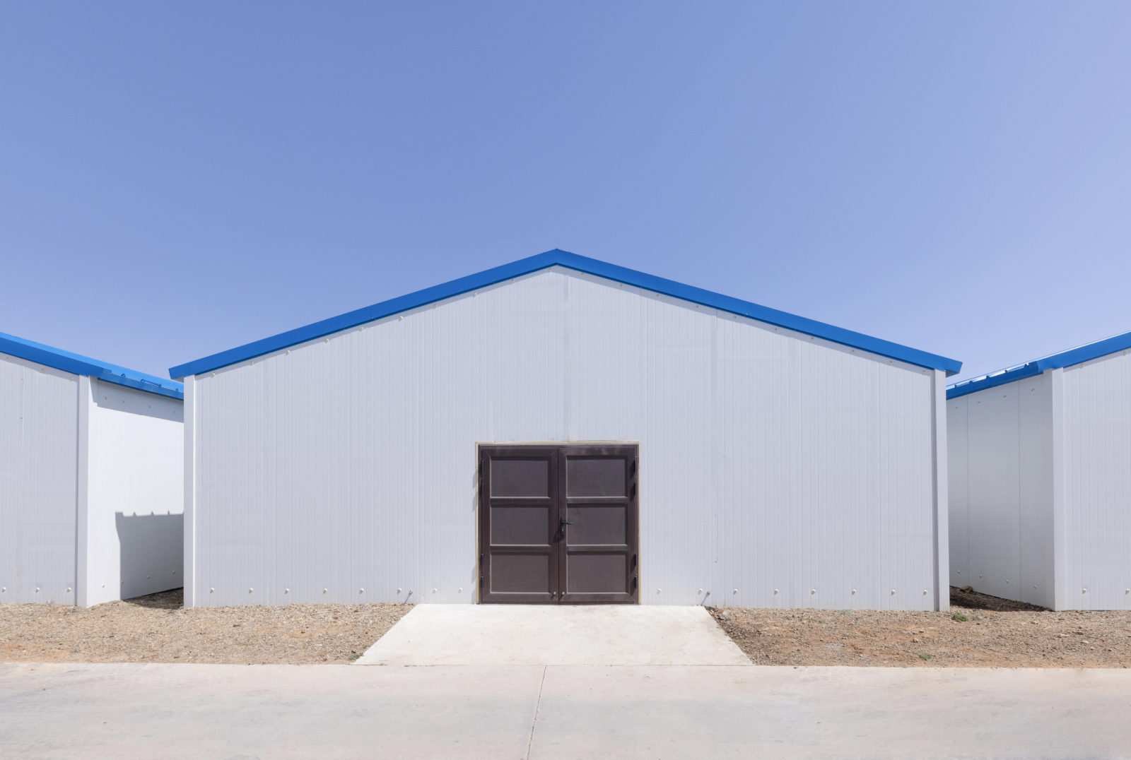 Exterior of Sunselin's steel-structured cultivation houses